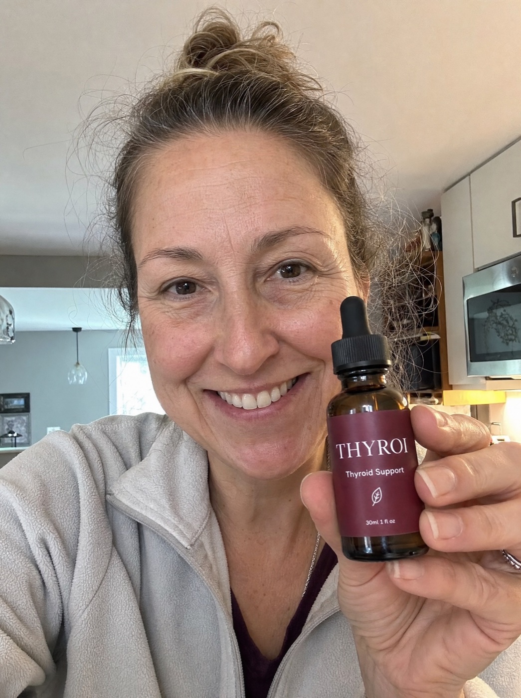 Real customer holding Thyroi